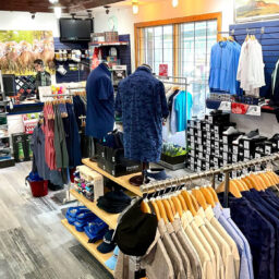 Golf pro shop interior featuring apparel, accessories, and equipment displays at Bighorn Golf & Country Club