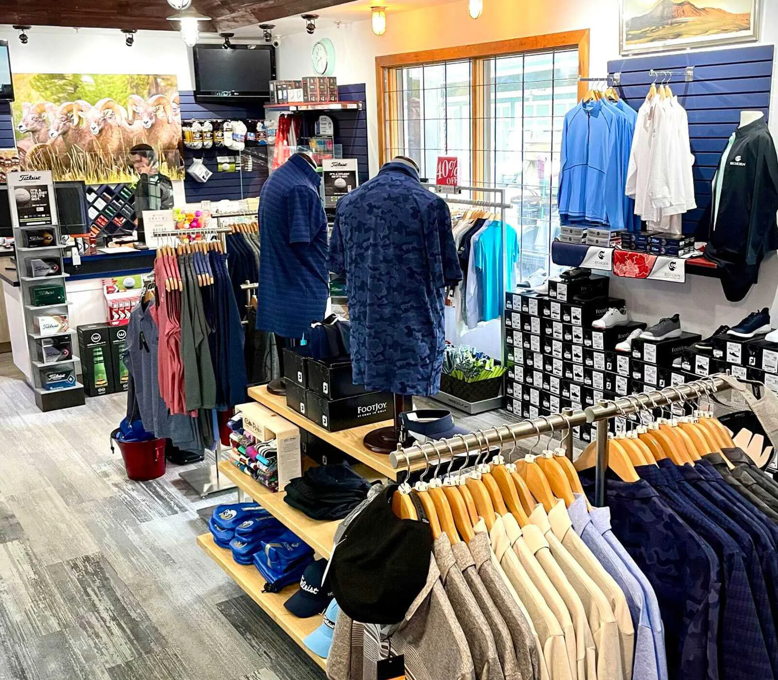 Golf pro shop interior featuring apparel, accessories, and equipment displays at Bighorn Golf & Country Club